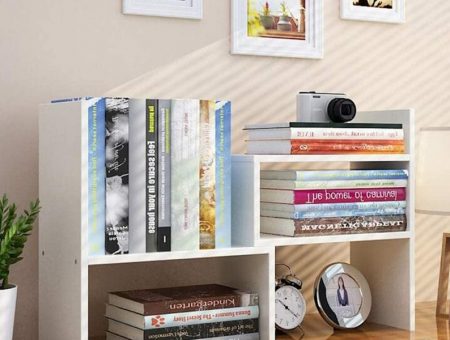 desktop bookshelf with adjustable countertop and various books showcasing it's stability.