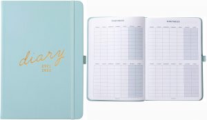 a 'busy  b' duckegg coloured planner pictured closed and open with timetable inserts.