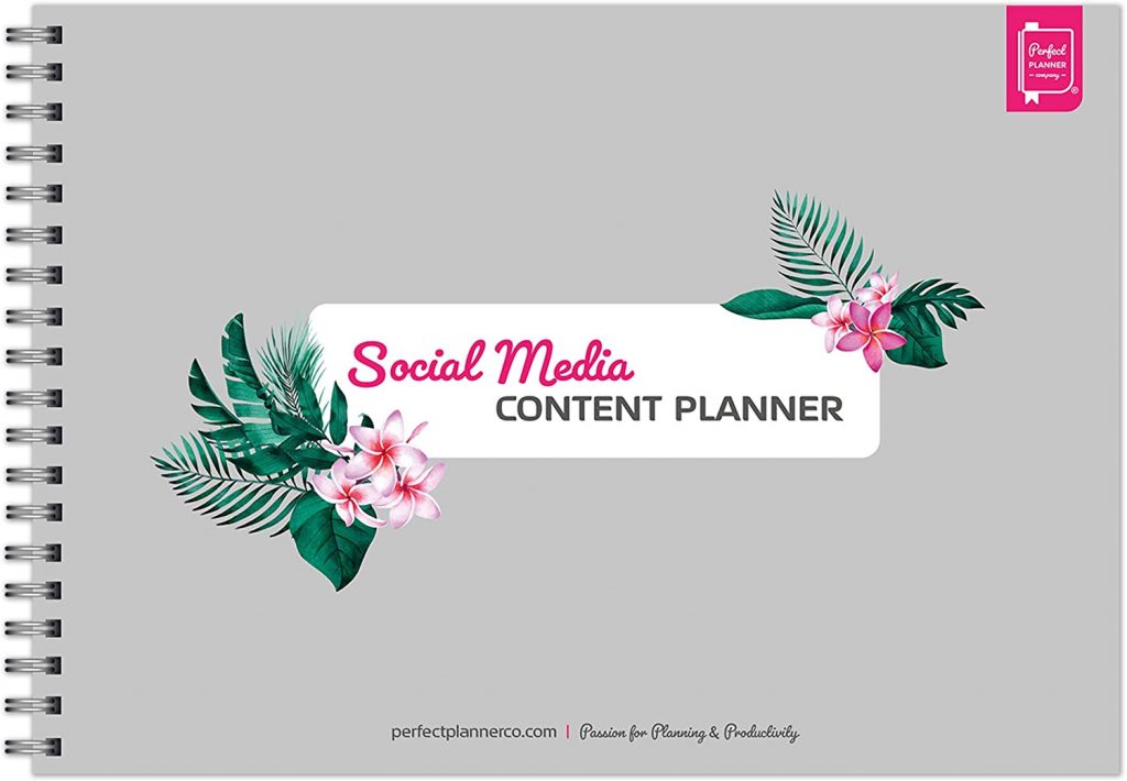 a grey spiral social media planner book with flower clipart.