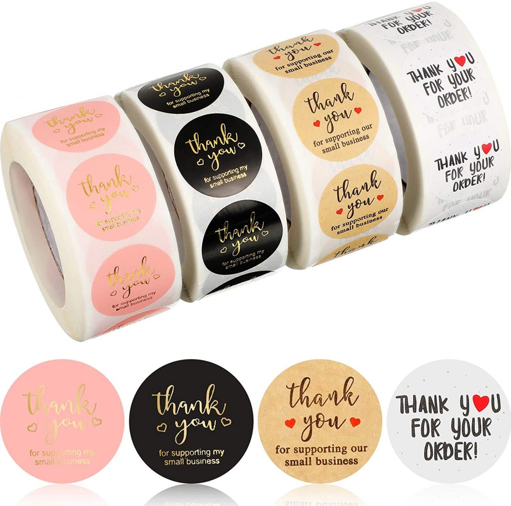 Four rolls of differently styled 'thank you'  stickers.